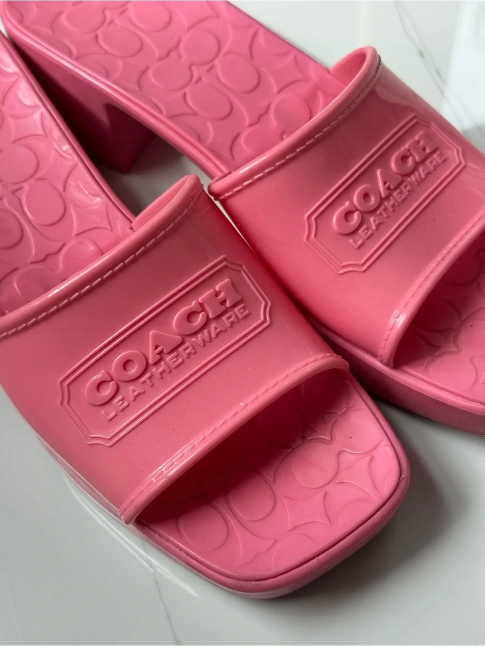Coach Pink Slide Mules with Embossed Logo Strap